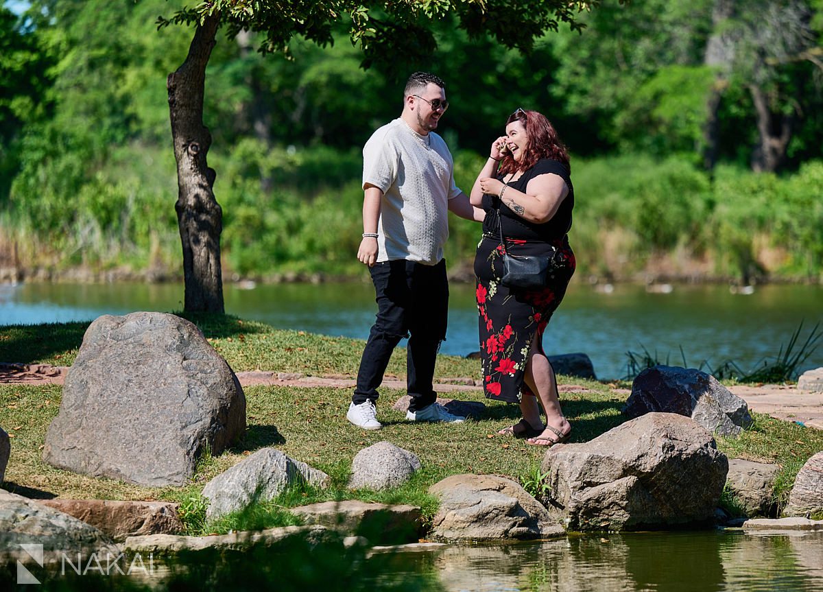 Proposal at garden of phoenix, wiping tears away in Chicago's Hyde Park