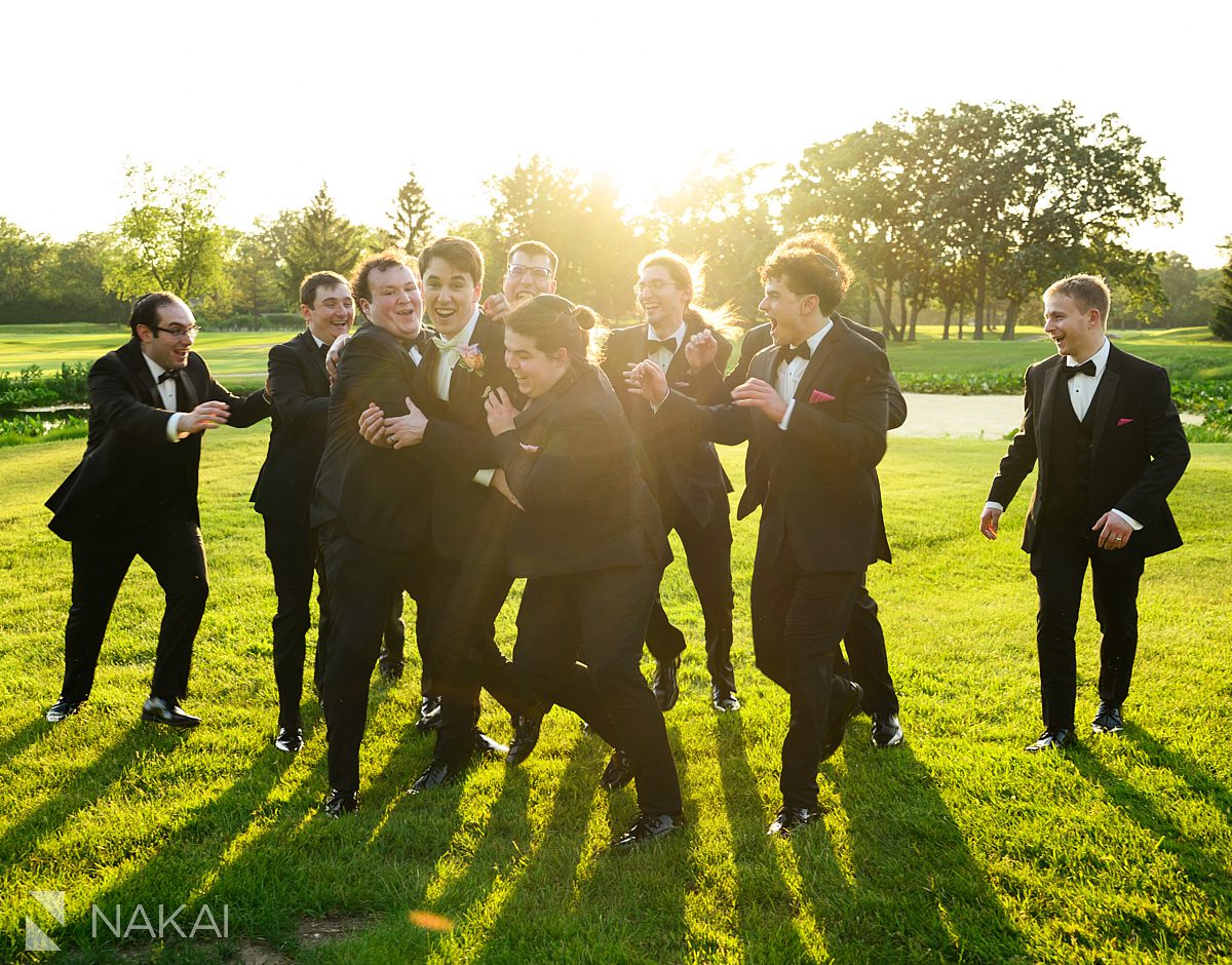 Ravinia Green Country Club Wedding outside groomsmen fun 