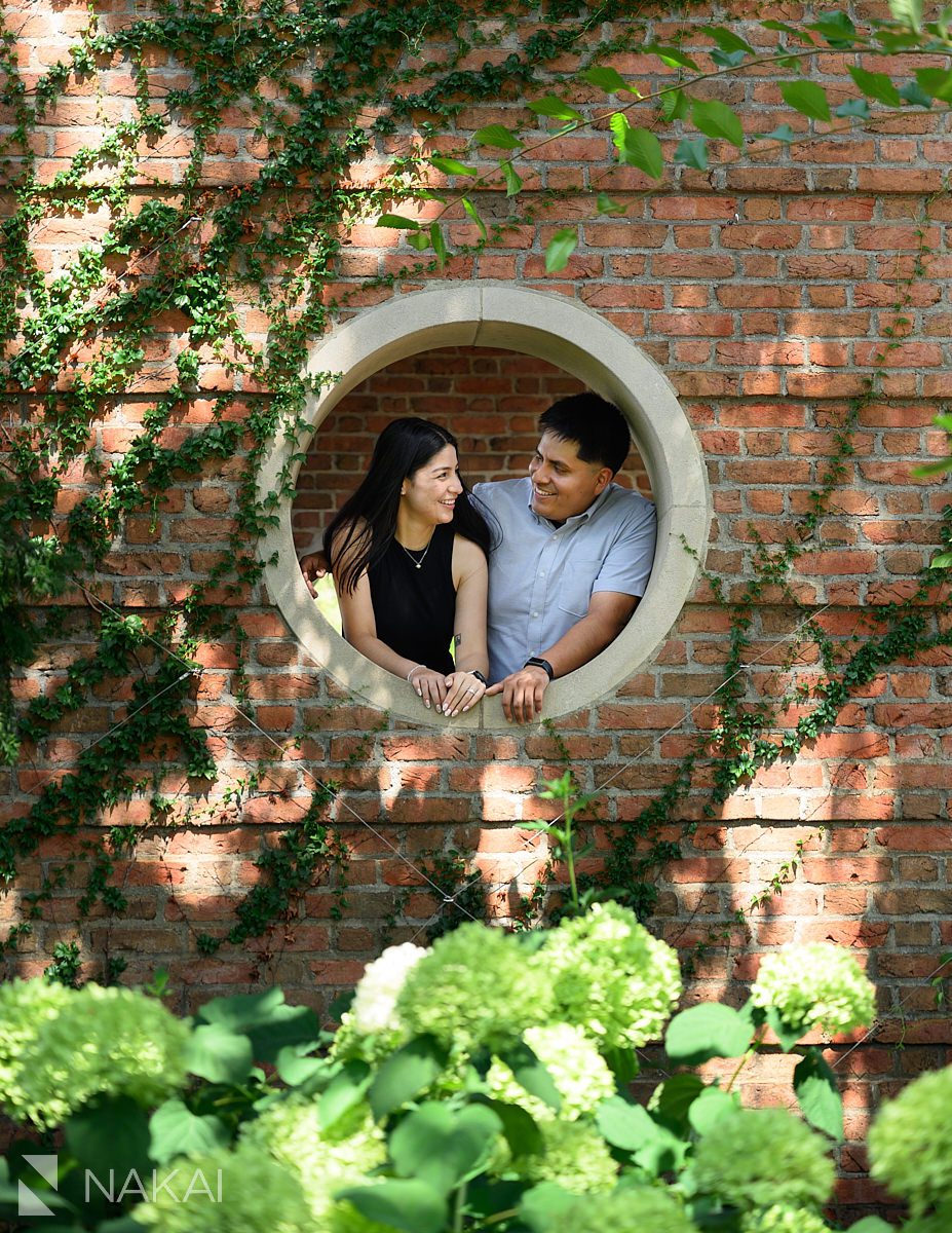 couple in english walled garden for Chicago botanic gardens proposal photos
