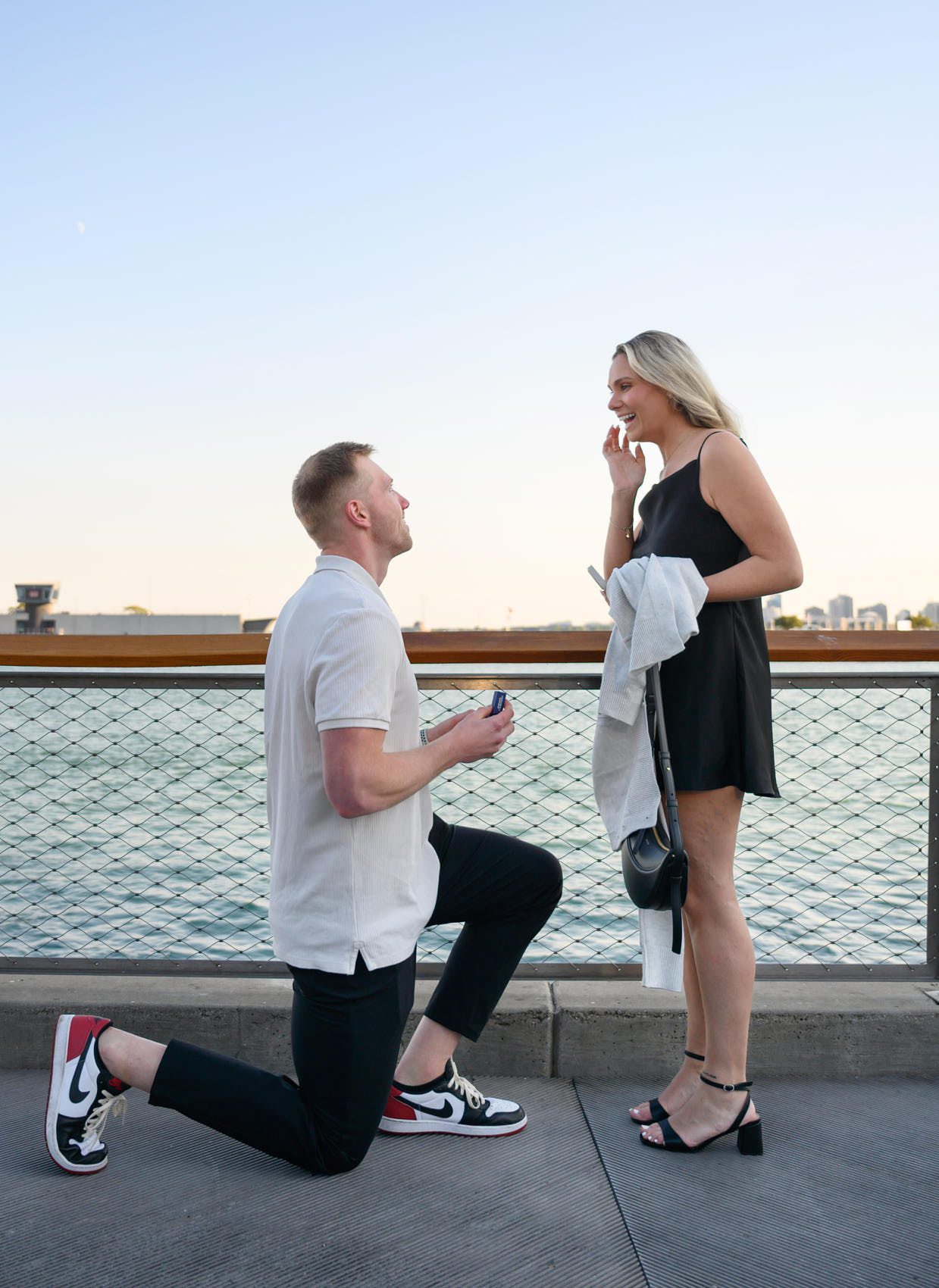 chicago navy pier proposal surprised expression on bended knee