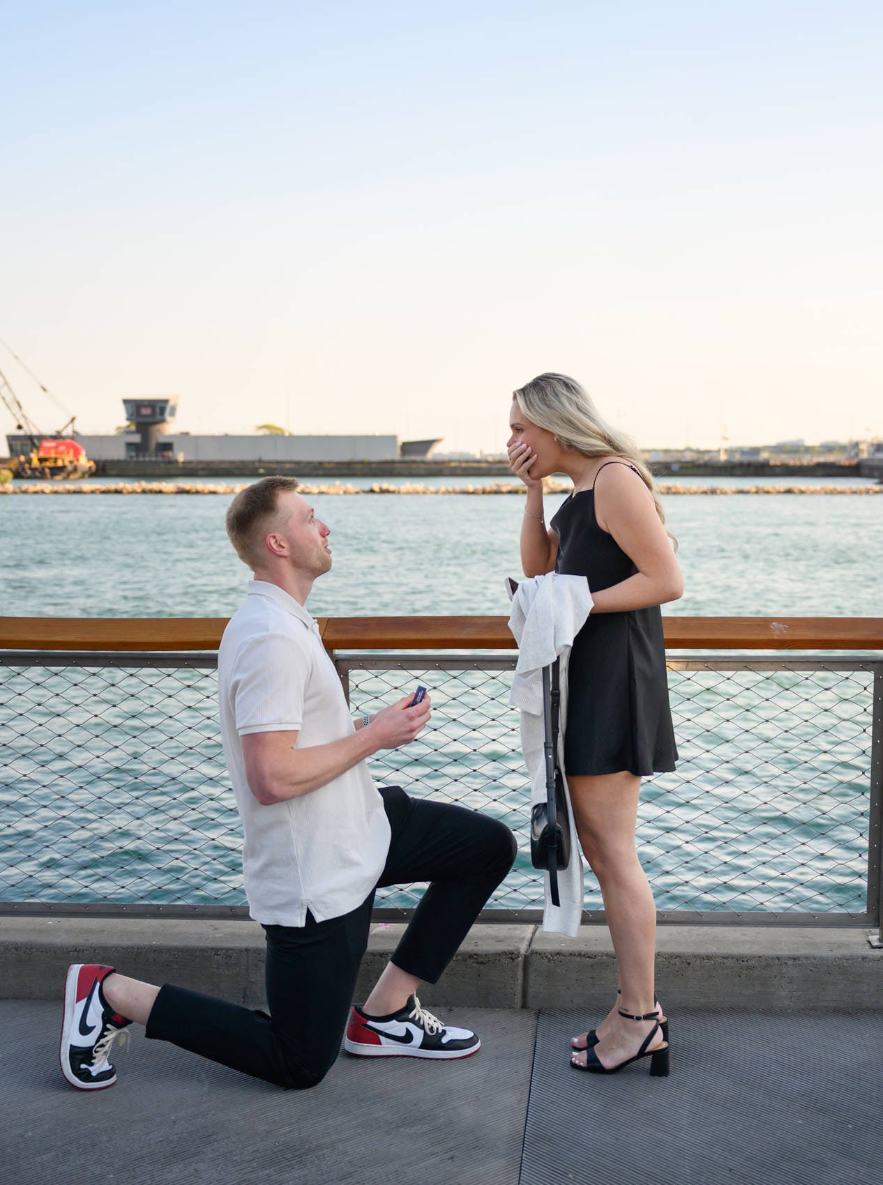 navy pier proposal photos on bended knee