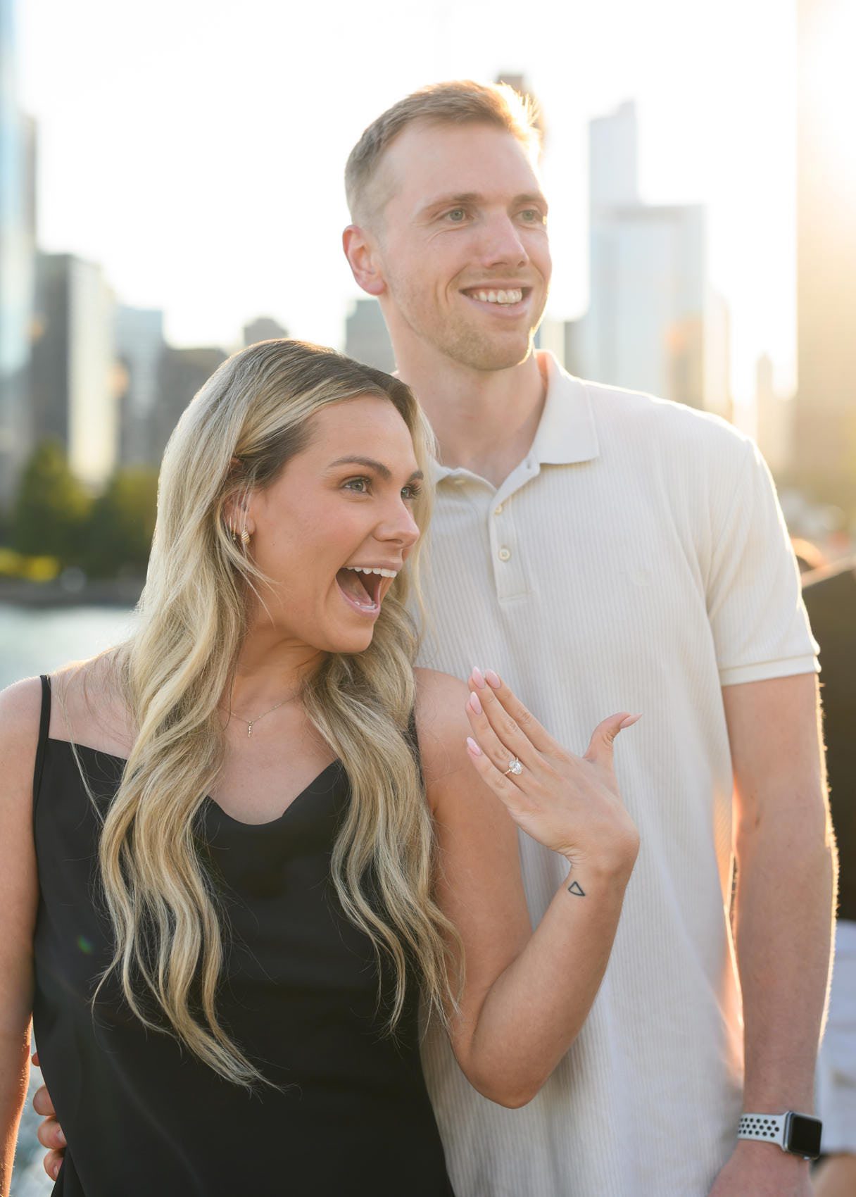 navy pier proposal photos showing off her ring