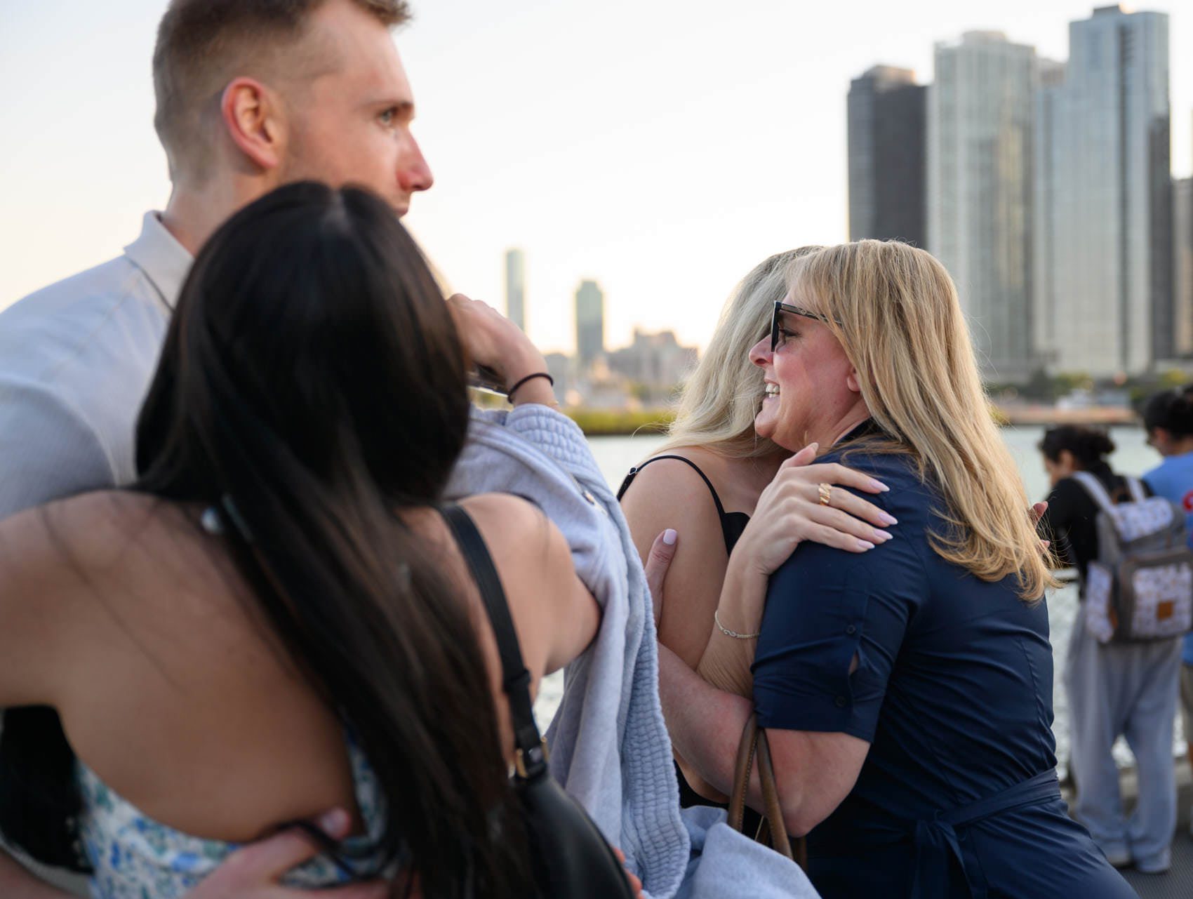 surprise navy pier proposal hugging mom