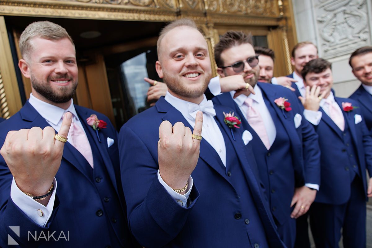 chicago wrigley building wedding pictures groomsmen
