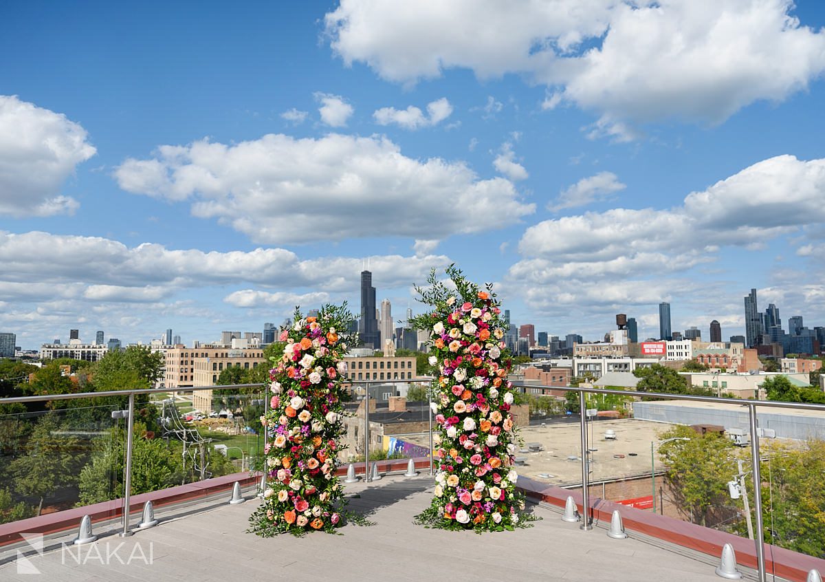 lacuna lofts wedding ceremony rooftop decor view of skyline