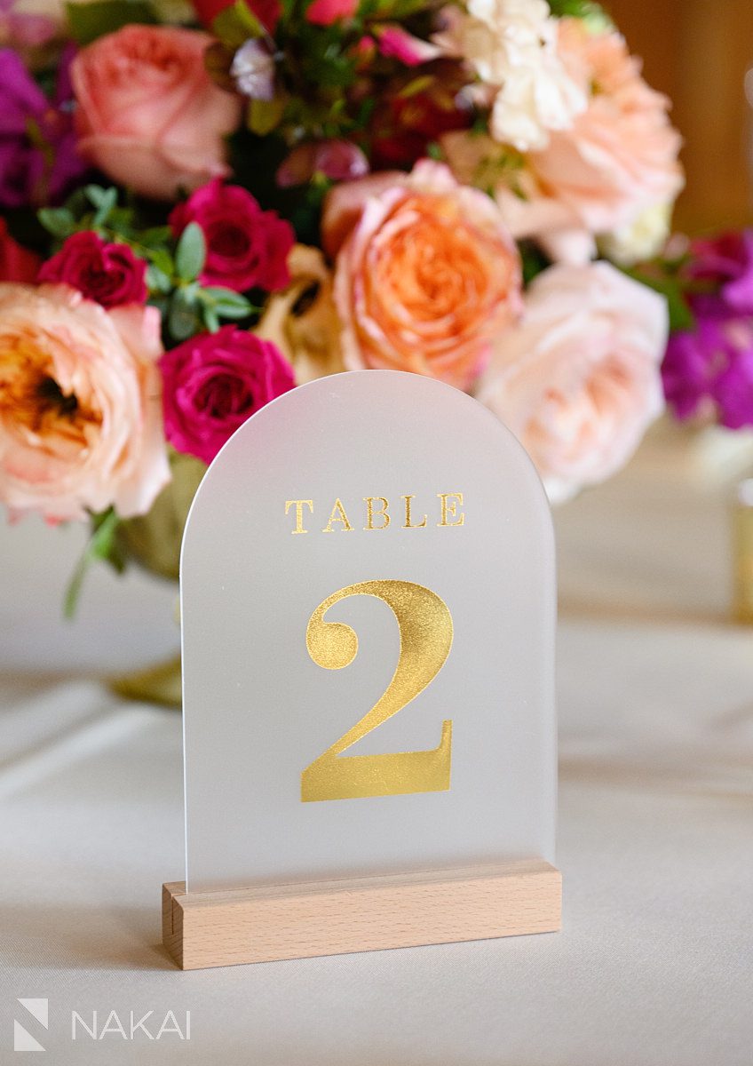 lacuna lofts wedding reception table number flowers