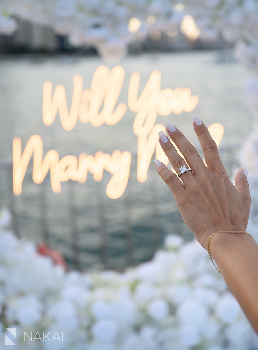 chicago proposal spots sunset will you marry me sign in background