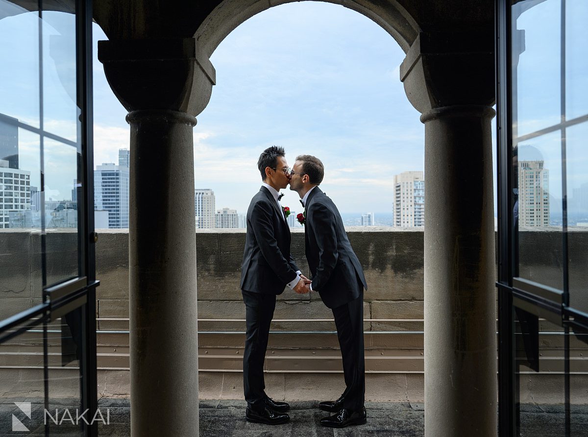 same sex wedding chicago intercontinental chicago magnificent mile rooftop kiss