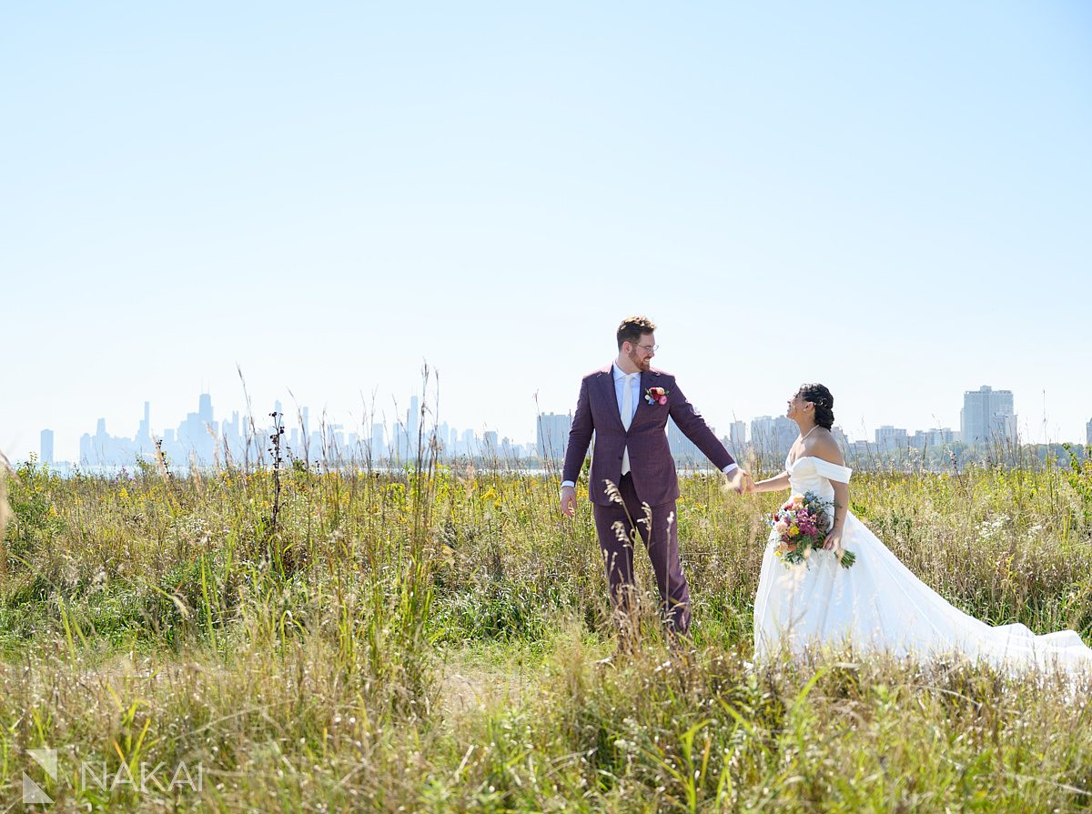 montrose beach wedding photography bride and groom walking