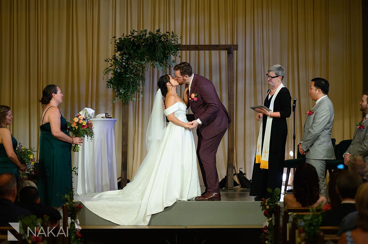 Chicago logan square wedding ceremony christian church kiss