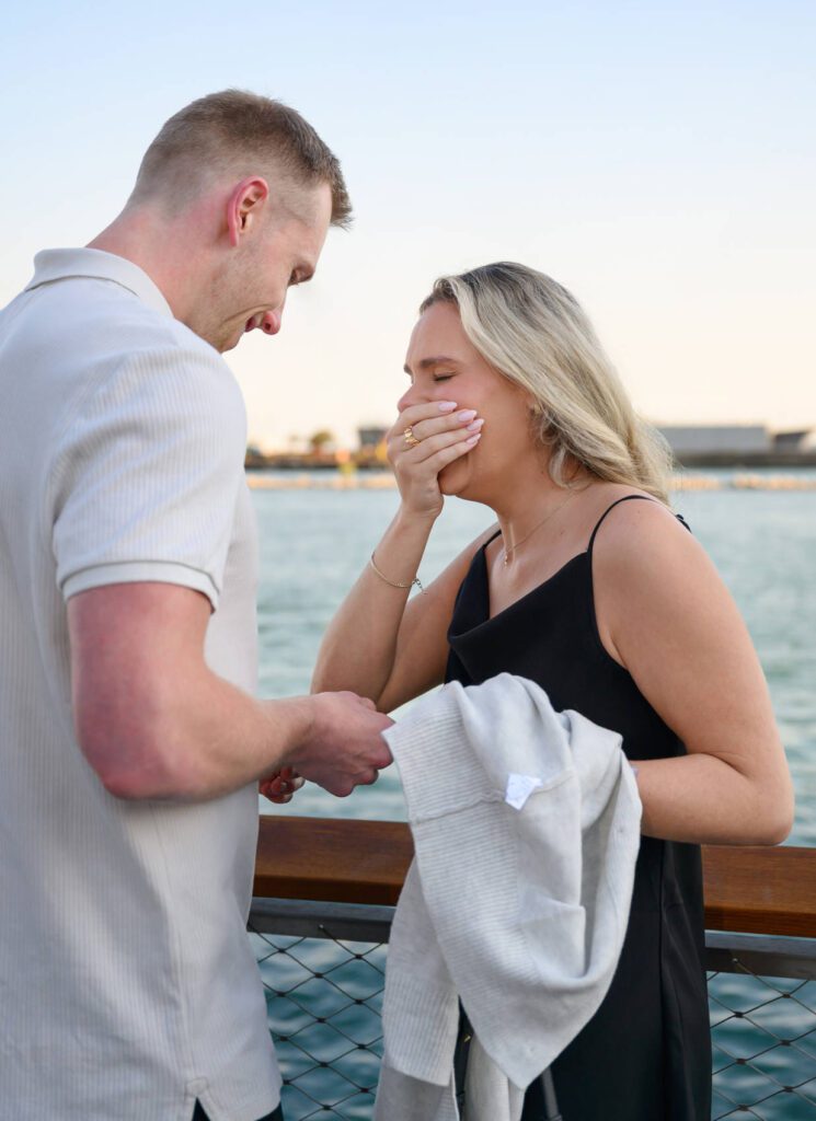 Chicago proposal photographer at Navy Pier, woman overwhelmed with emotion