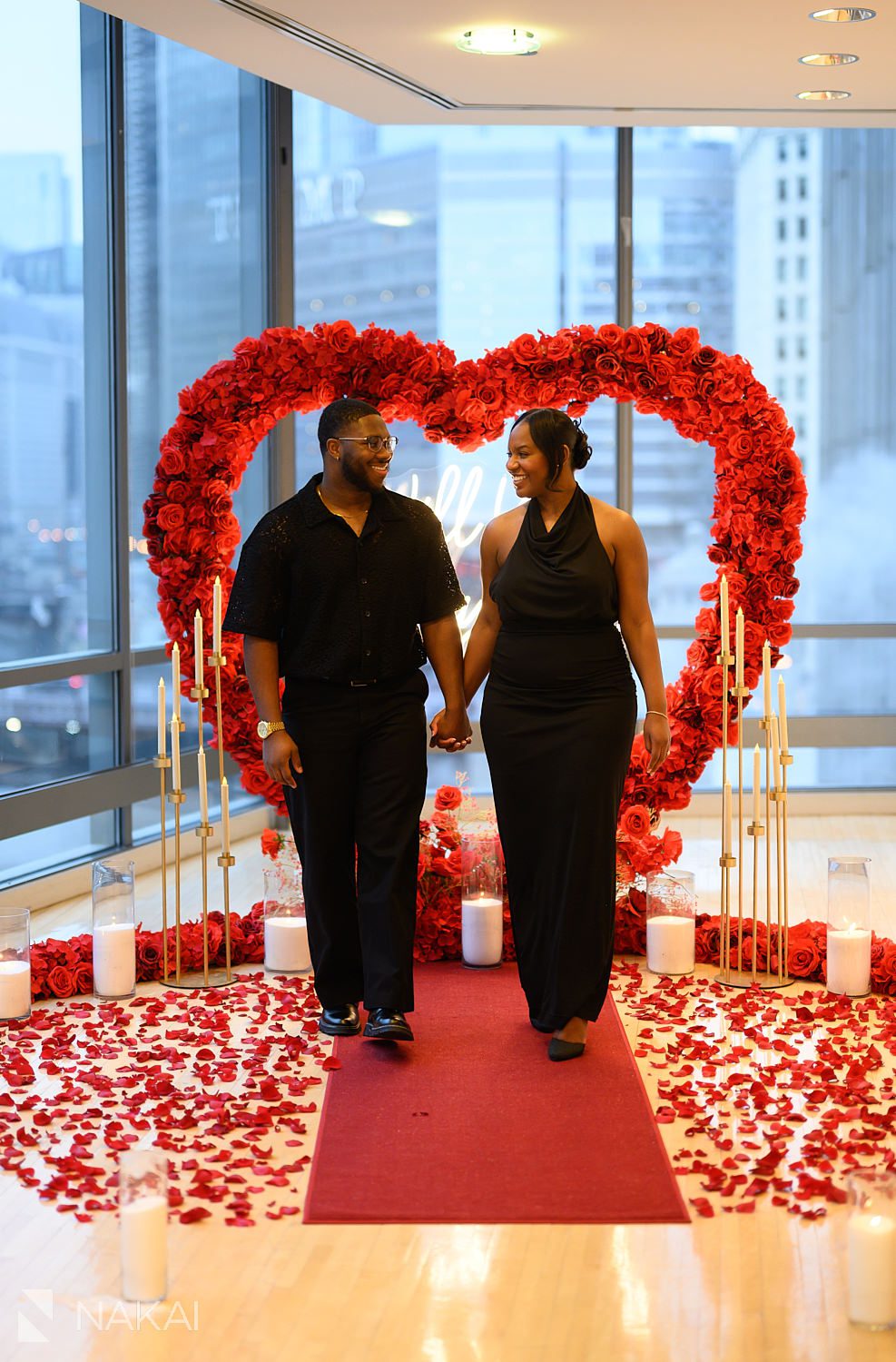 flower wreath chicago proposal couple walking in holding hands