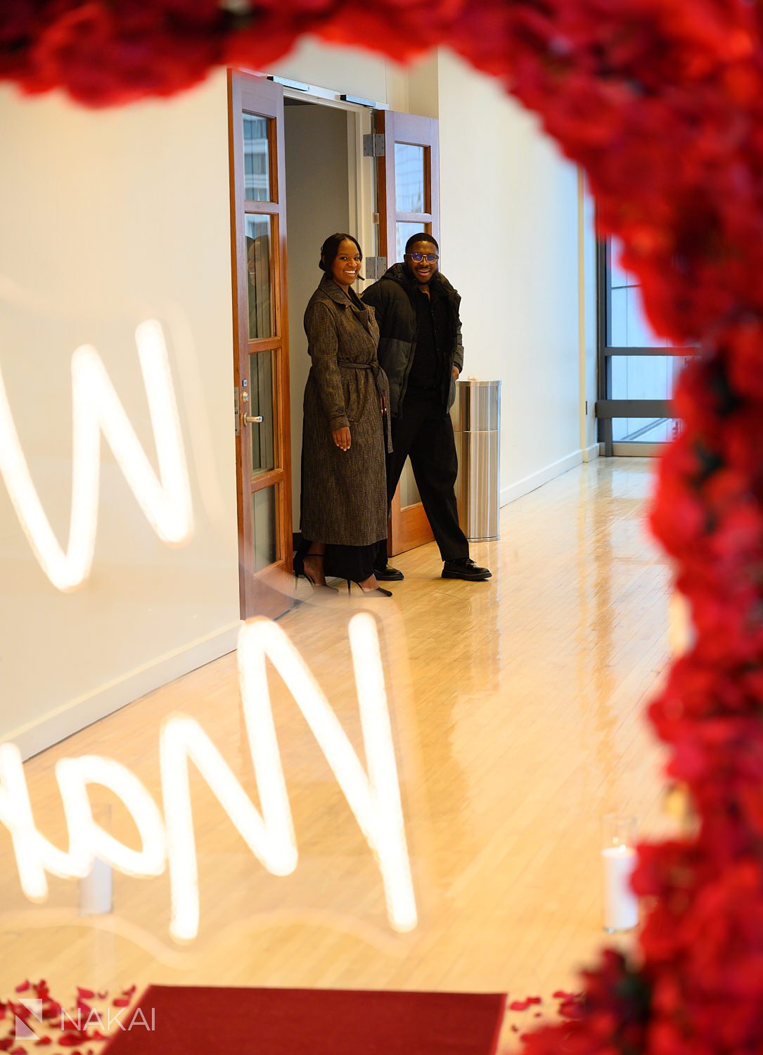 indoor winter chicago proposals couple walking into room