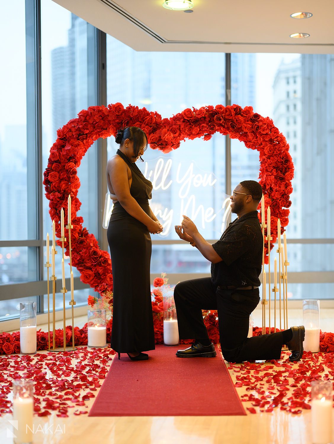 indoor winter heart wreath chicago proposals guy on bended knee