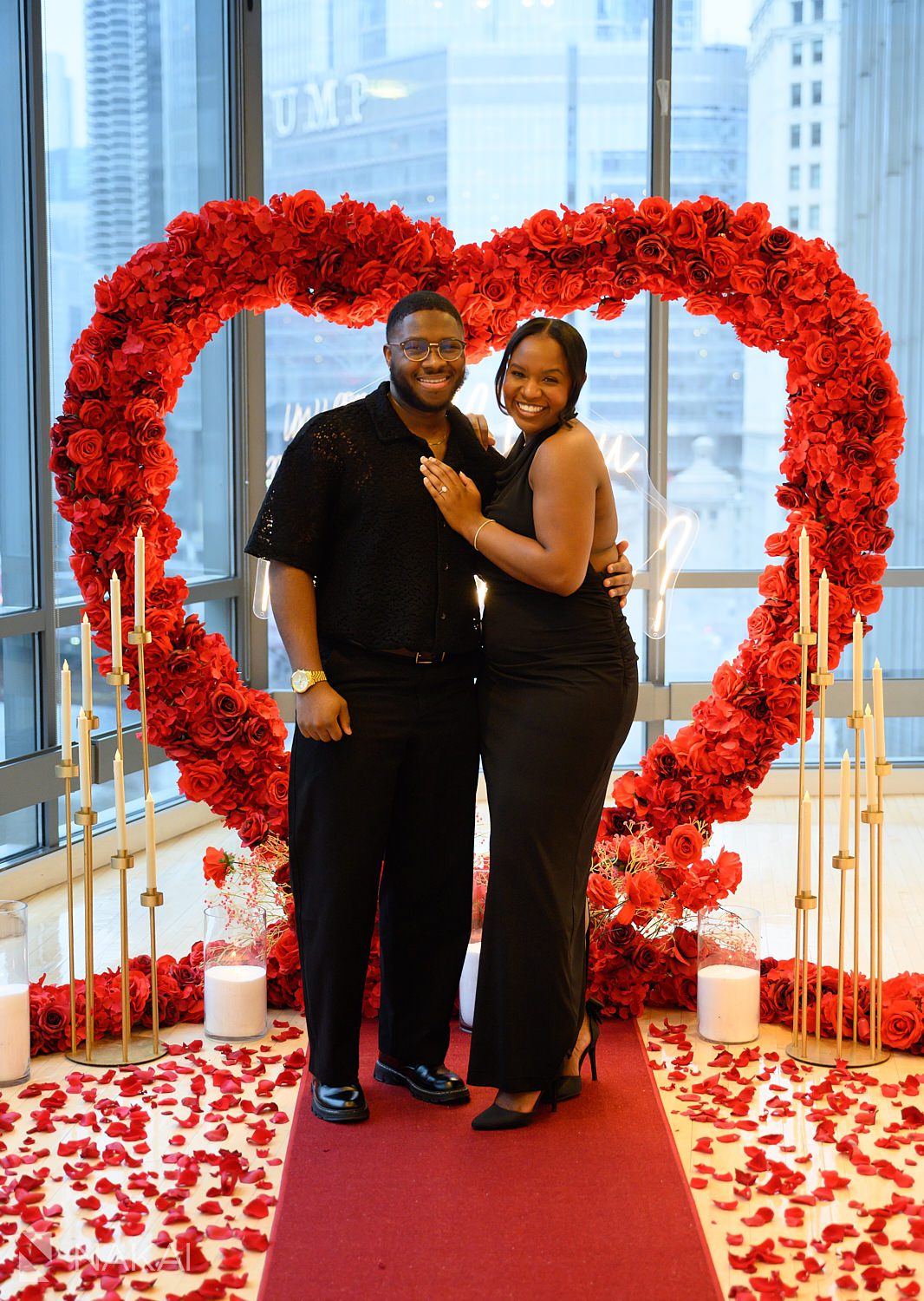 indoor chicago luxury proposals during winter by window overlooking riverwalk 