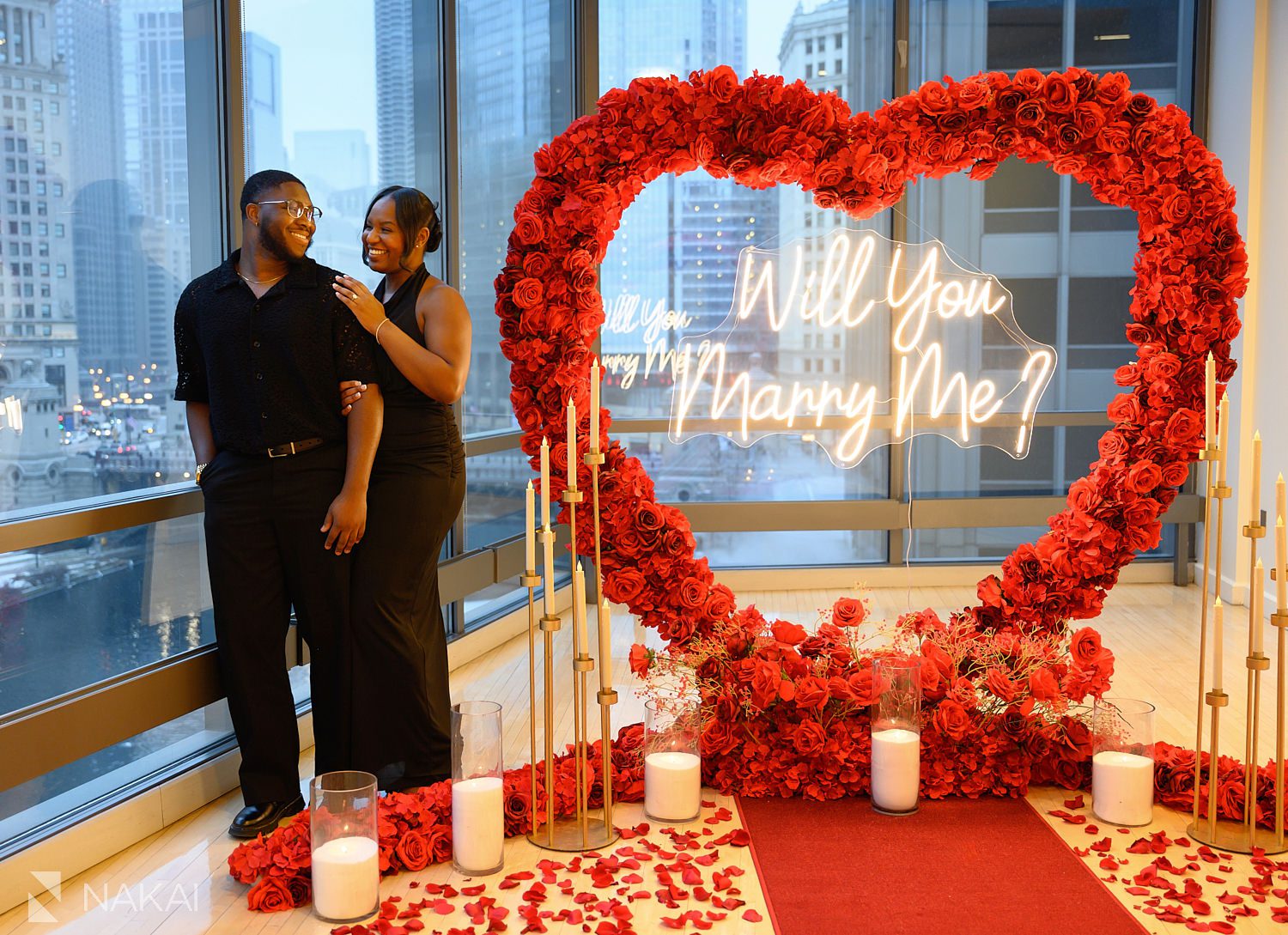 indoor chicago luxury proposals during winter by window overlooking riverwalk 