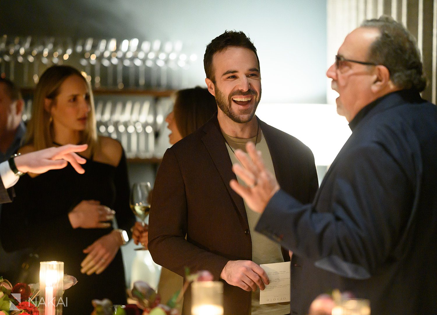 oriole chicago private dining laughing during cocktails