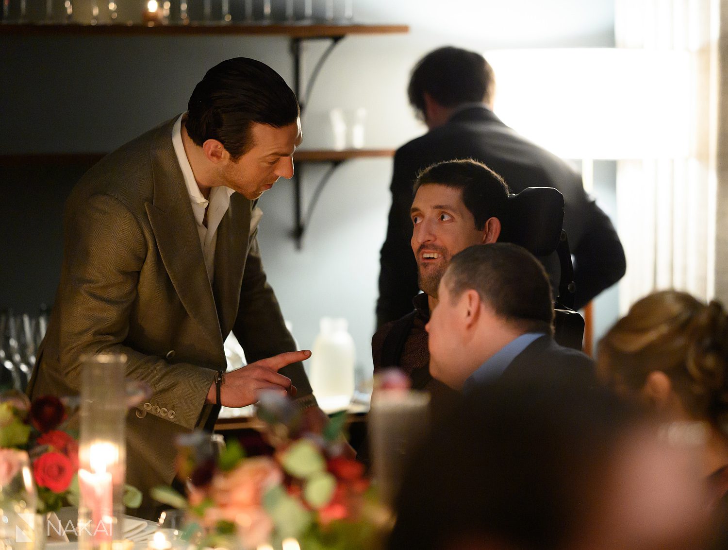 two men talking during a private dining oriole event