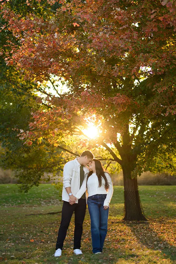 fall colors chicago engagement photo with setting sun