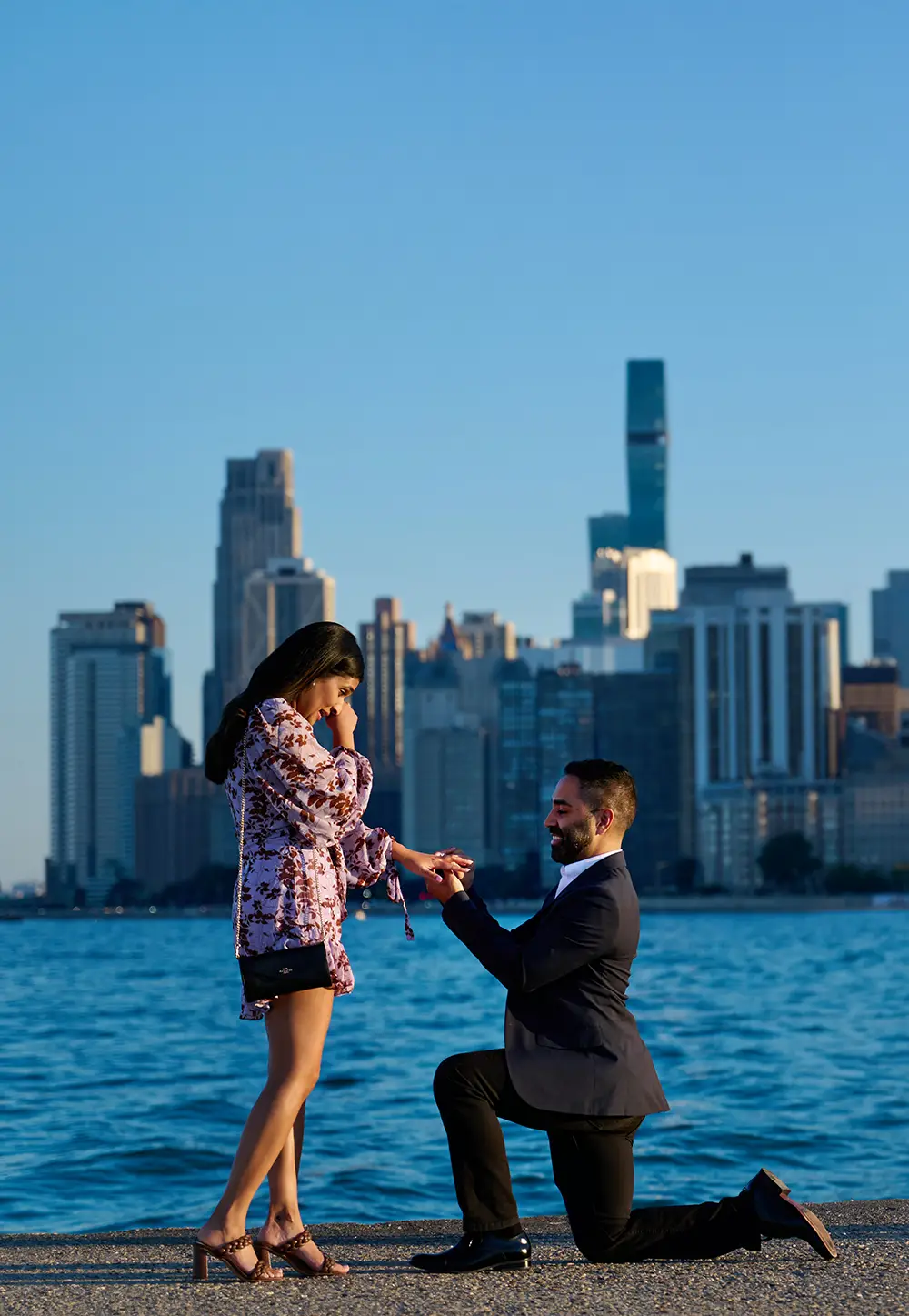 chicago proposal photo at North Avenue, woman wiping tear from her eye