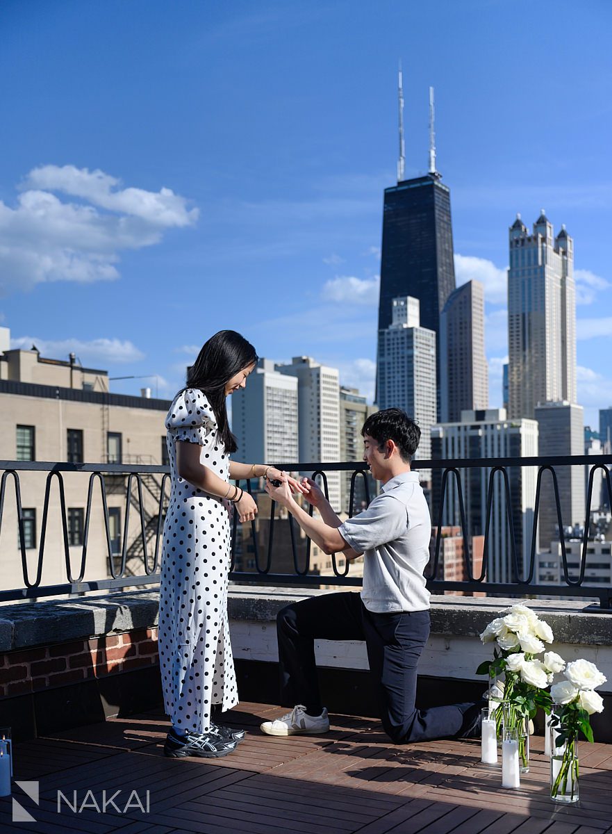 ambassador chicago private proposal guy on bended knee