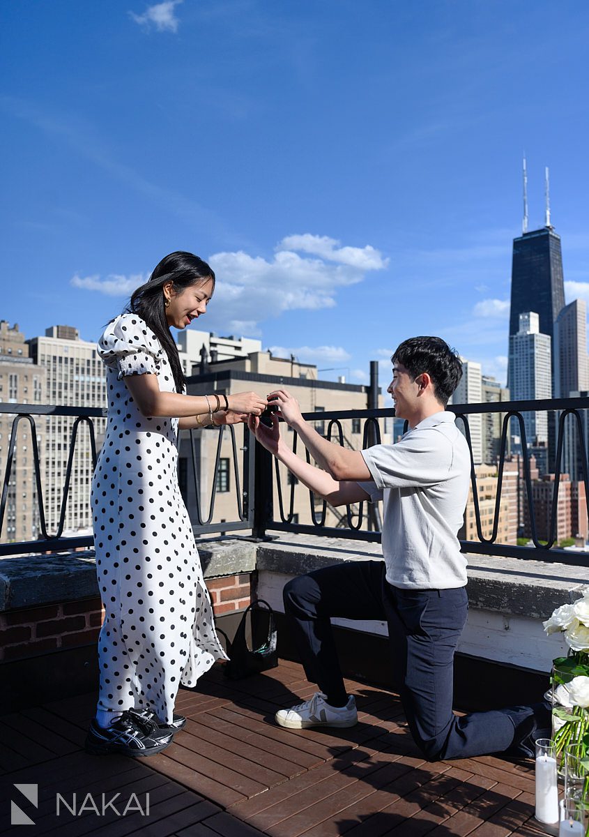 on bended knee chicago private proposal ambassador rooftop