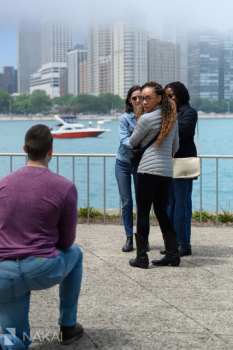 surprise look on her face during chicago lakefront proposal photos