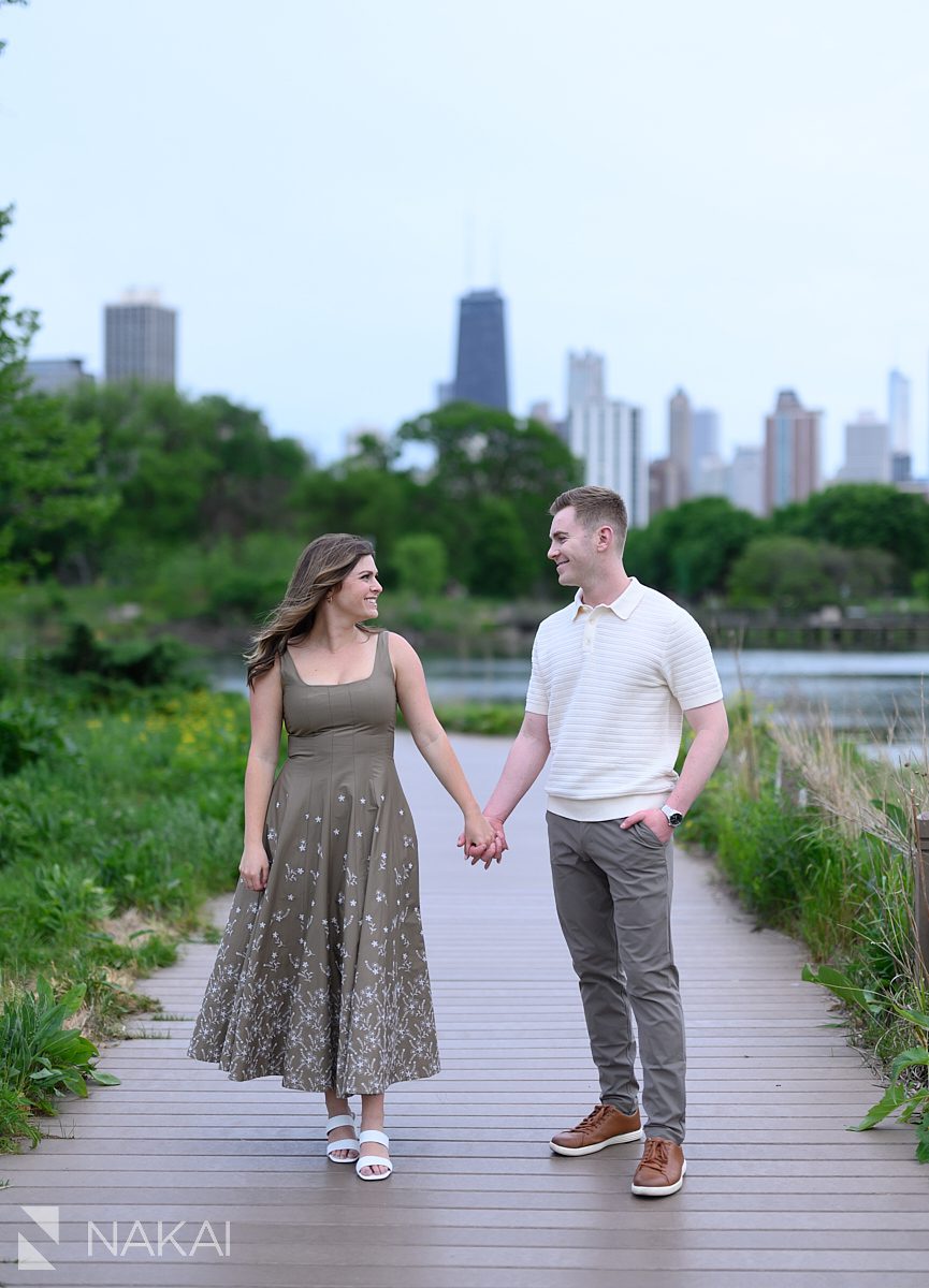 couple on boardwalk south pond chicago engagement photo