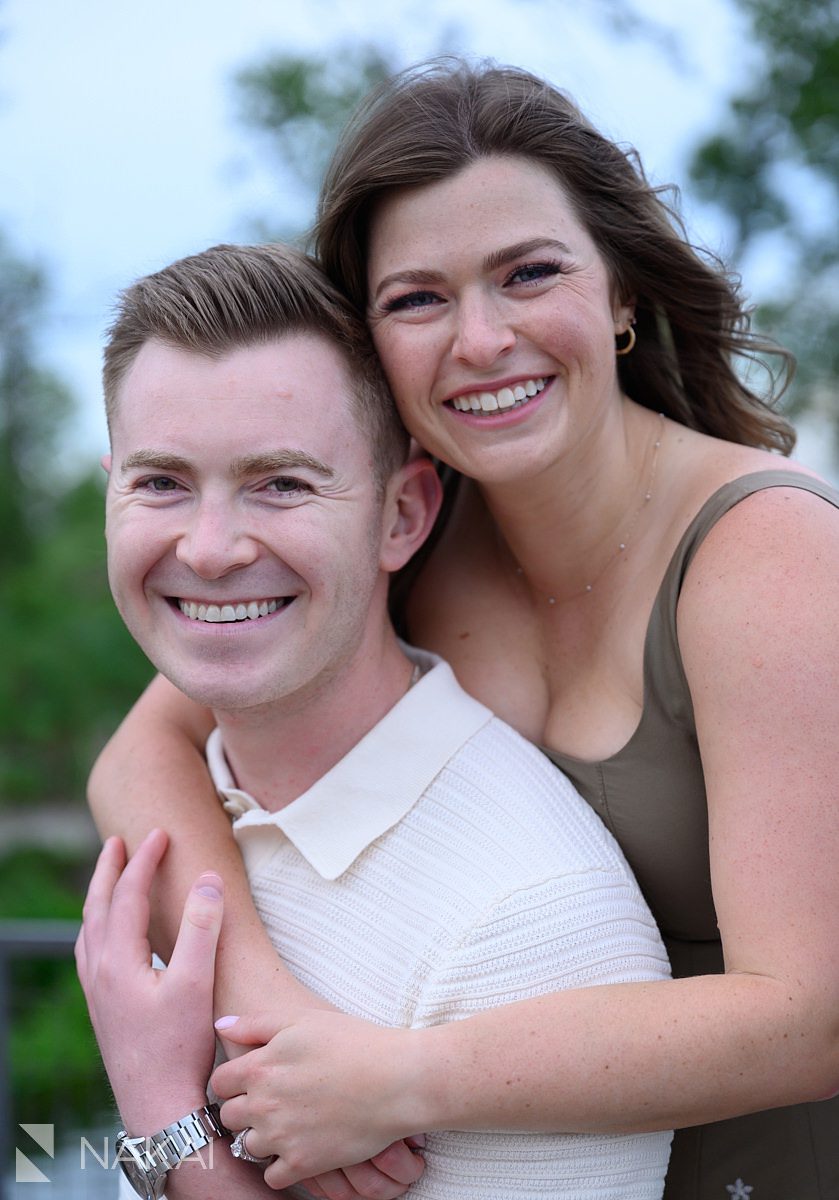 couple smiling at camera south pond chicago engagement photo