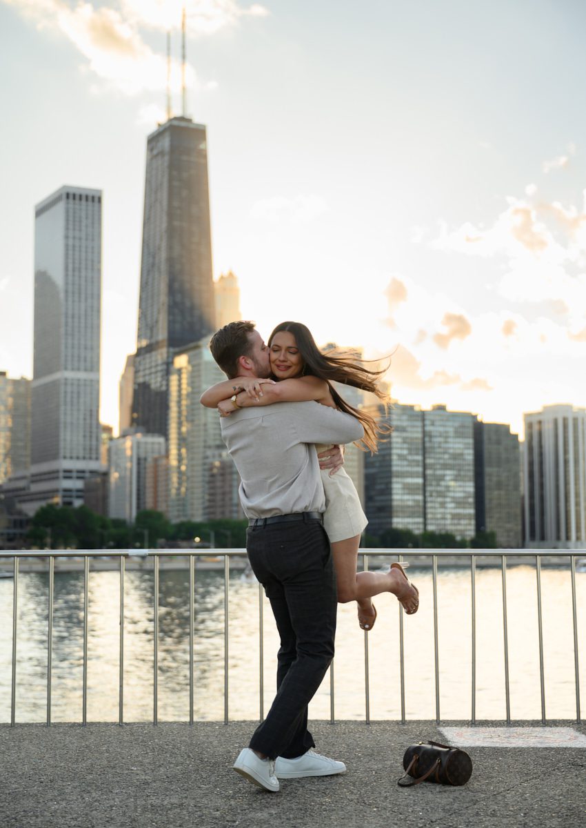 lift and twirl during sunset surprise proposal chicago
