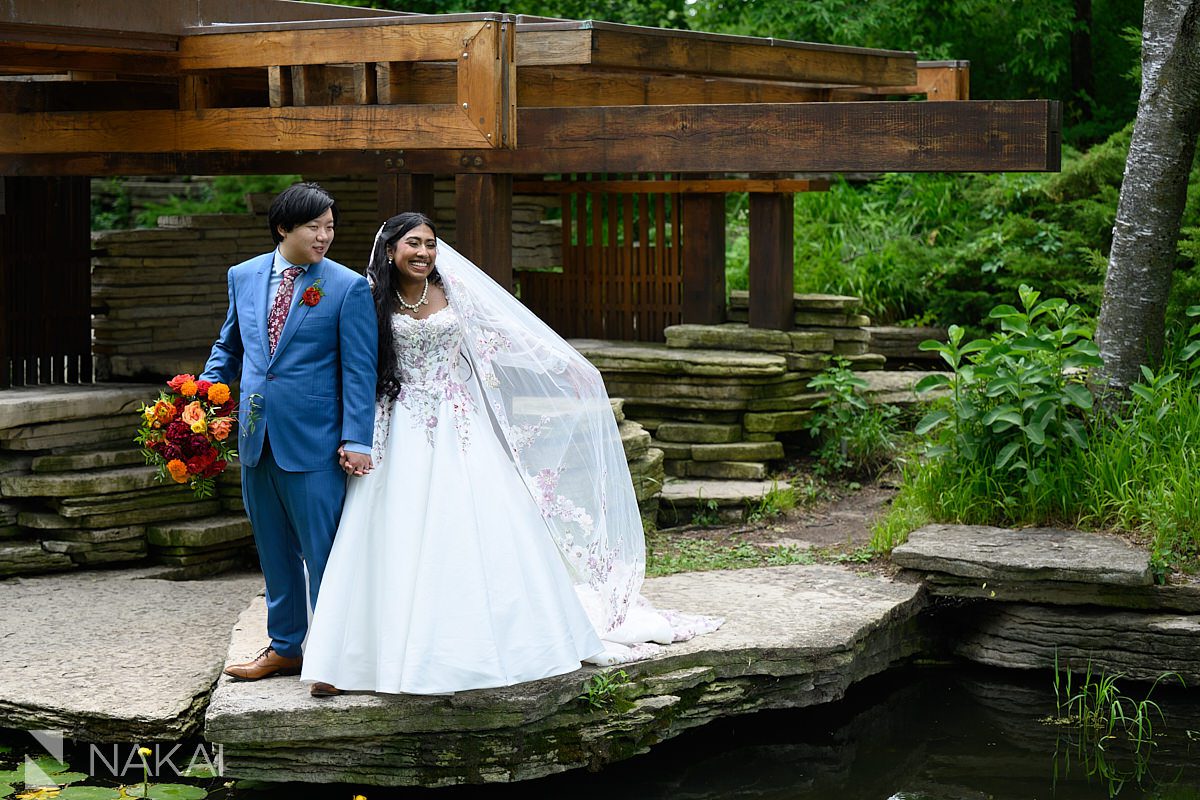 bride and groom smiling at each other at alfred caldwell lily pool wedding photos