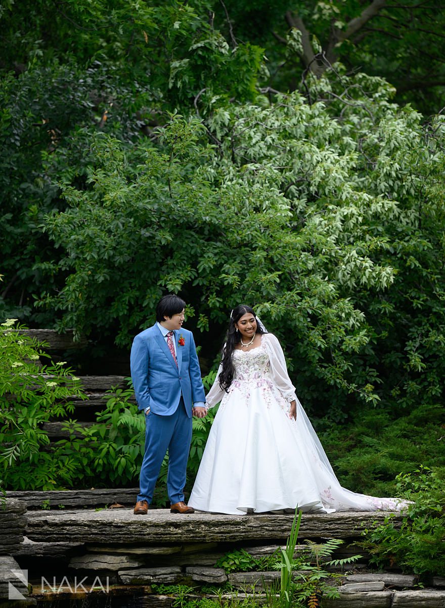 bride and groom in caldwell lily pool wedding photos