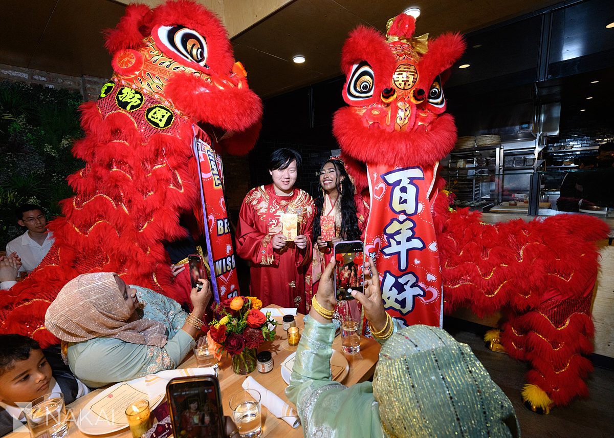 chicago lion dance wedding photo bride and groom in the middle