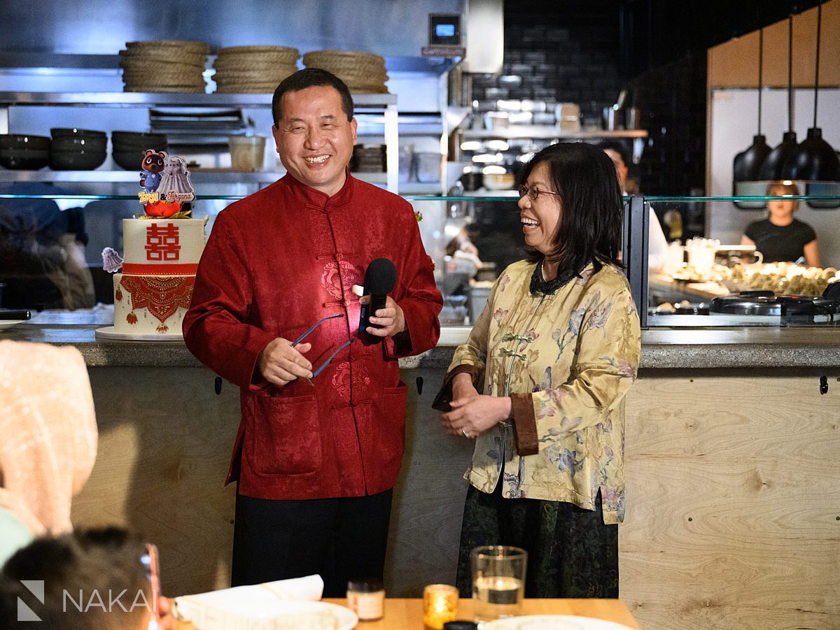 chinese parents giving toast at chicago restaurant wedding
