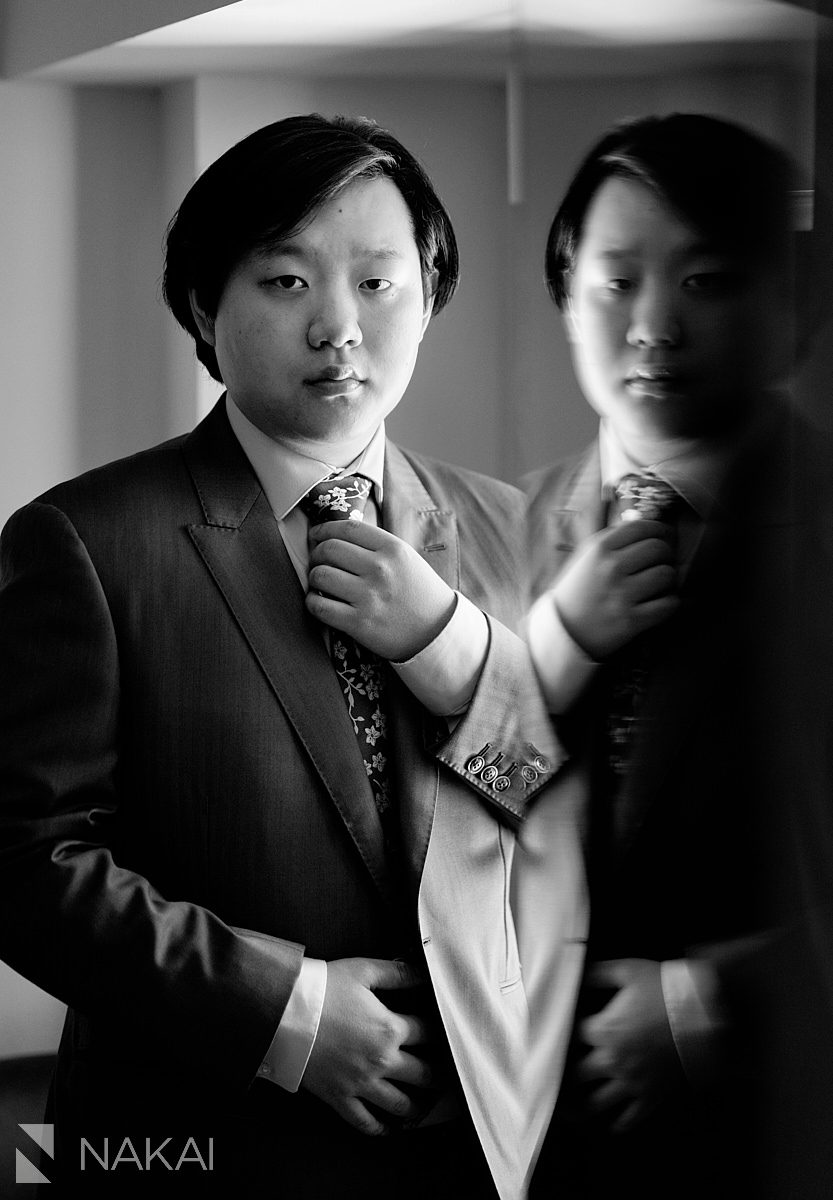 photo of groom with reflection
