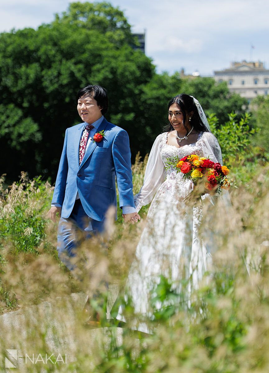 lincoln park wedding photo walking on path to honeycomb