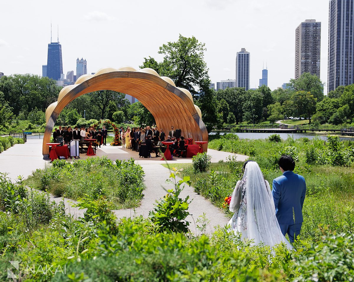 people's gas pavilion wedding ceremony bride and groom walking down sidewalk