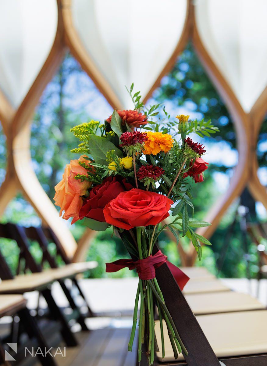 people's gas pavilion wedding ceremony set up floral and decor