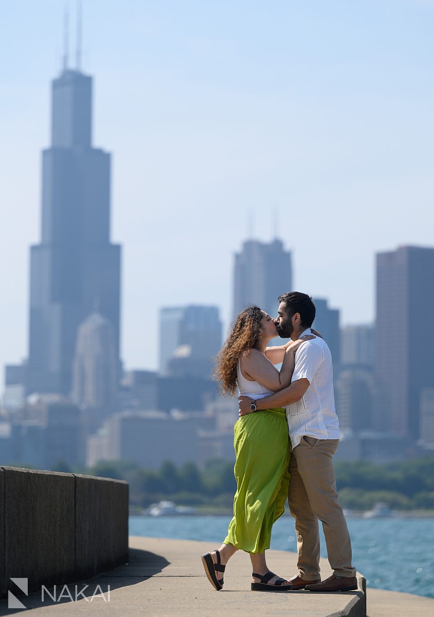 couple kissing during adler planetarium engagement