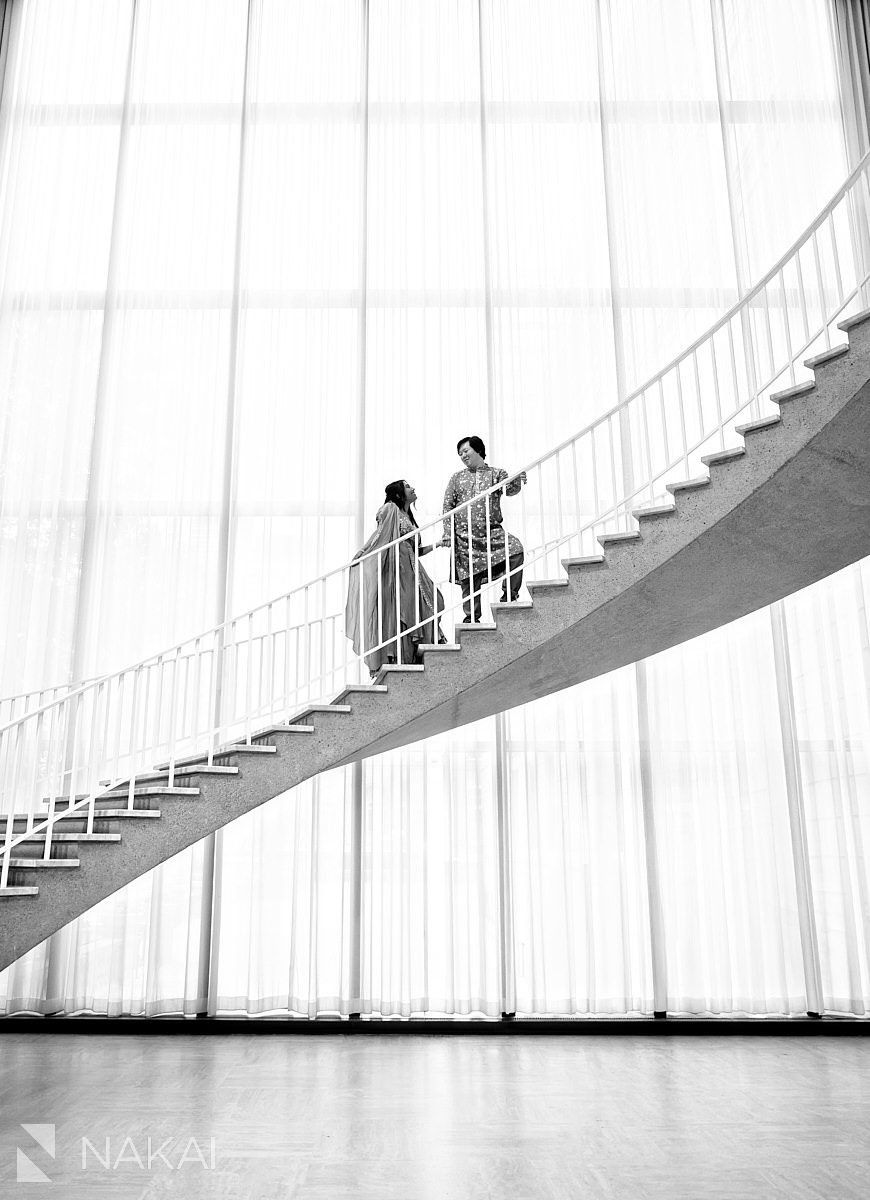 On spiral staircase for chicago art institute engagement photos