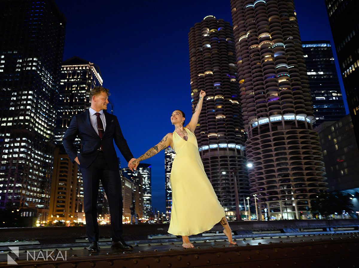 yellow dress dancing chicago riverwalk engagement night time