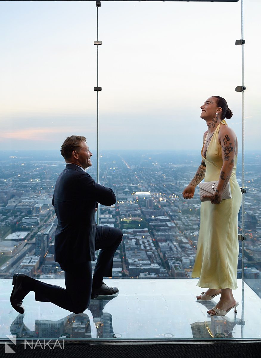 kneeling at chicago skydeck proposal 
