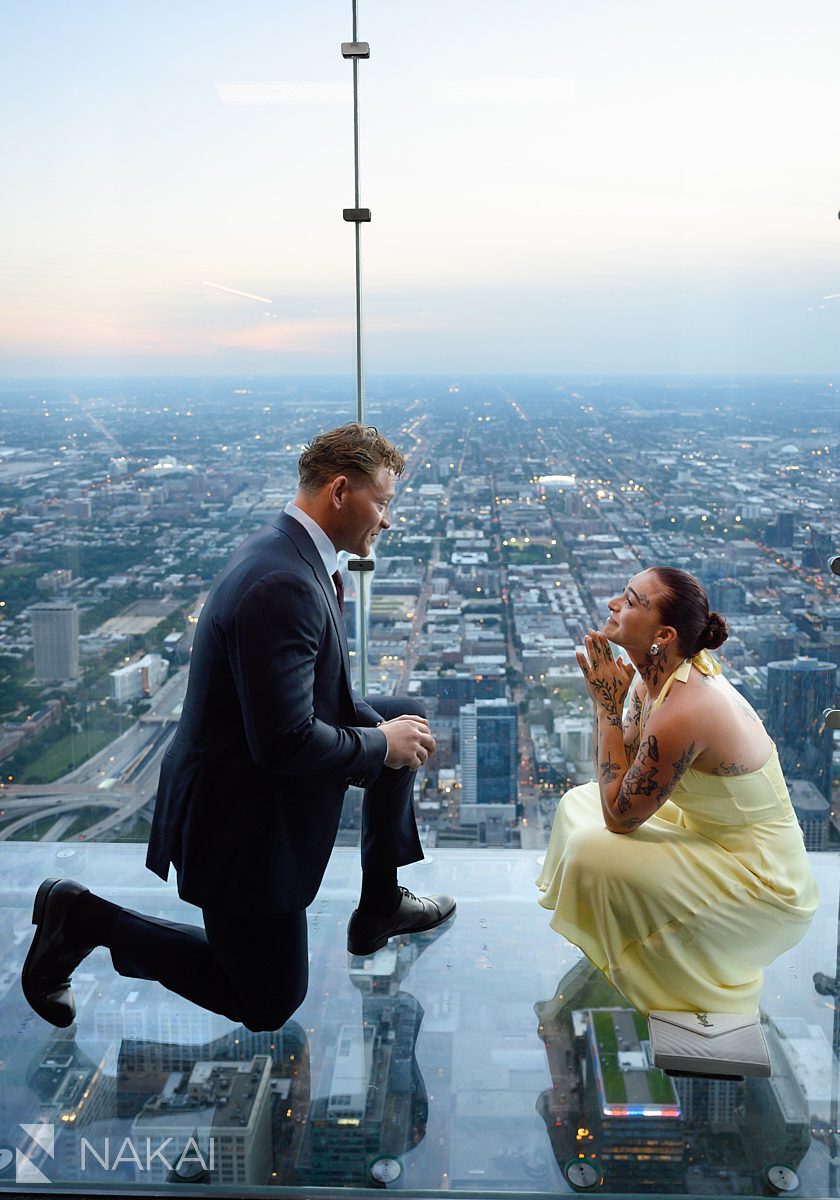 chicago skydeck proposal willis tower looking at each other