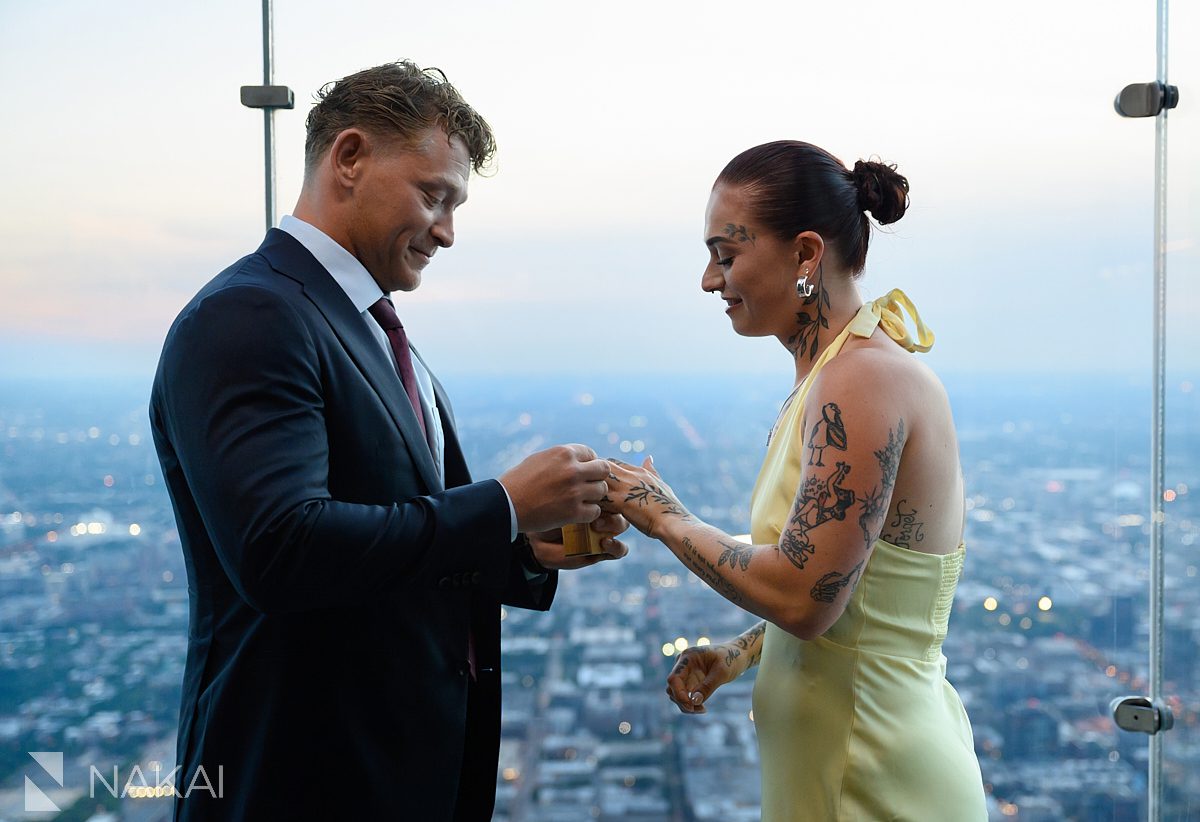 putting ring on finger chicago skydeck proposal willis tower