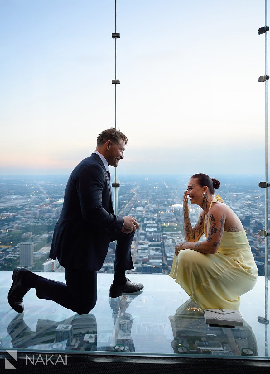 willis tower chicago skydeck proposal both on their knees with emotions