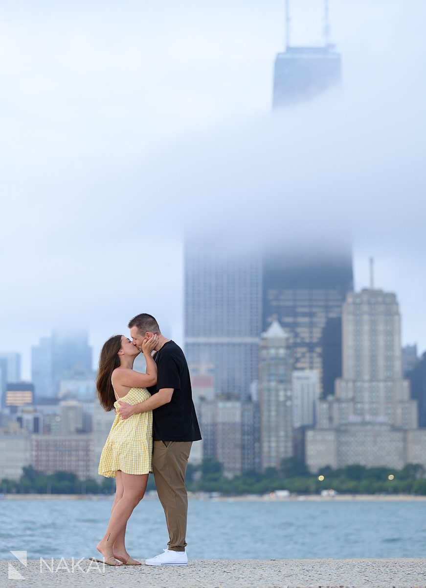 kiss at North ave beach chicago skyline in background