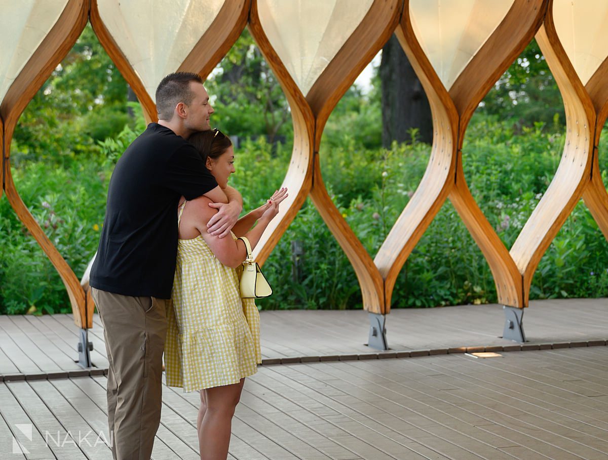 holding her after lincoln park proposal under honeycomb