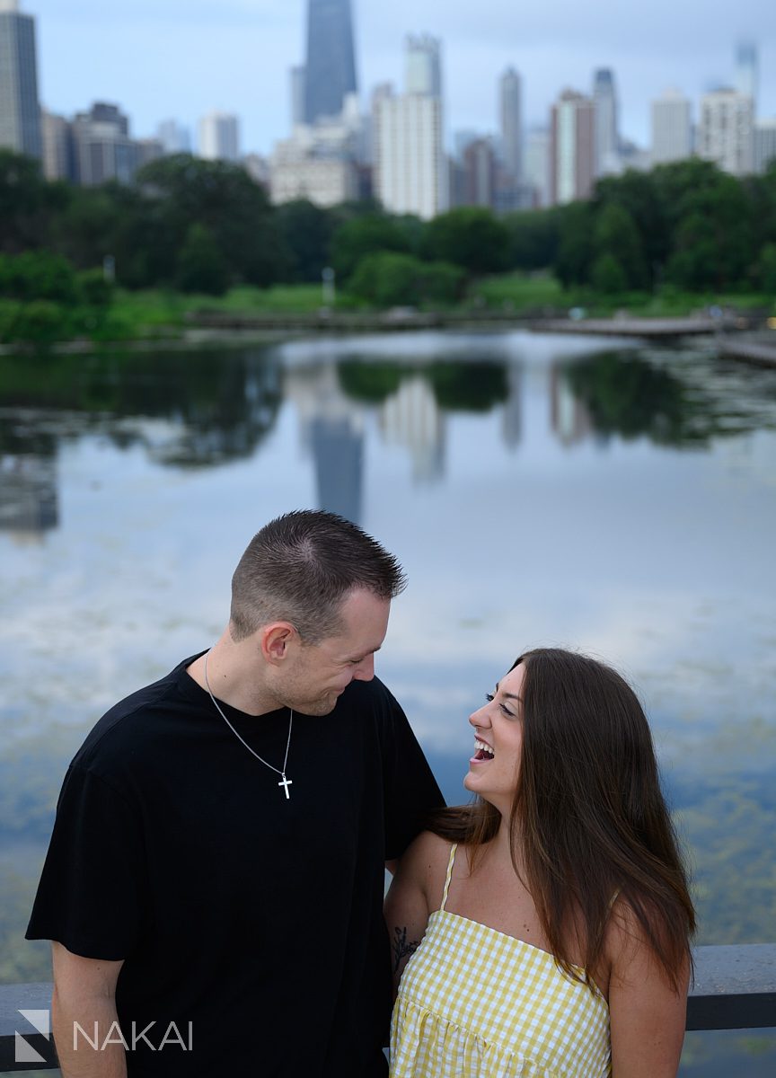 south pond behind couple looking at each other after lincoln park proposal