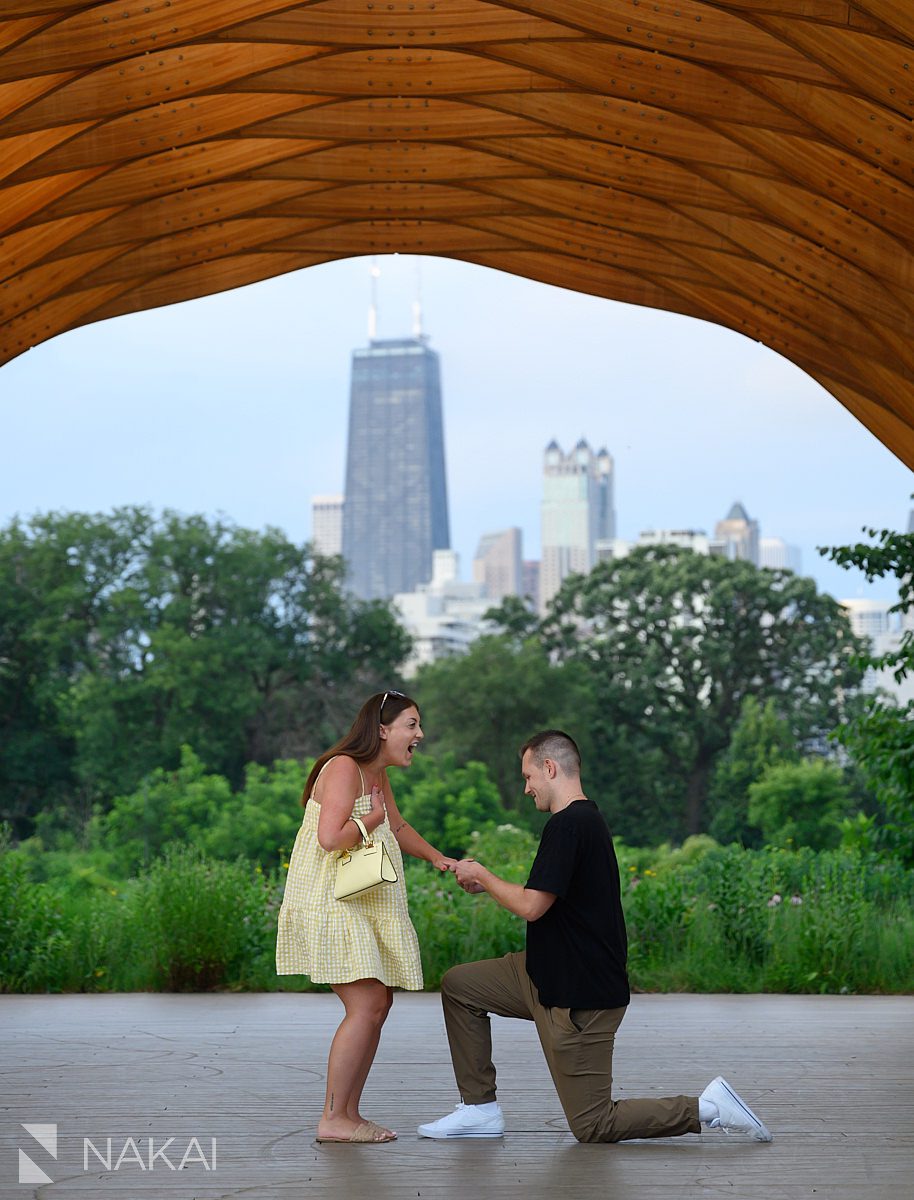 her excited expression at people's gas pavilion proposal