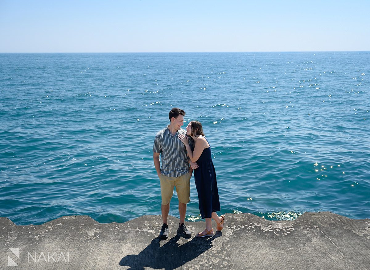 chicago lake Michigan engagement photos looking at each other